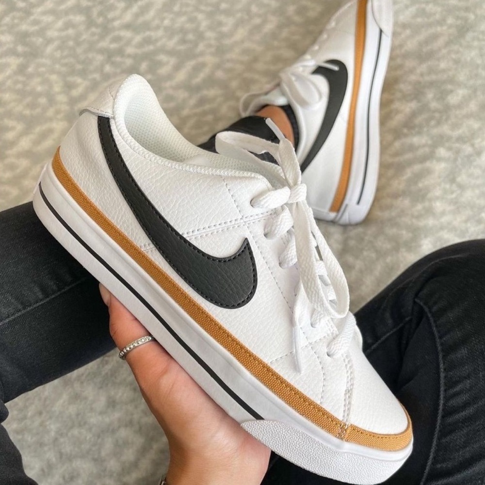 Nike Kids White Leather Sneakers with Black Swoosh and Gold Trim Stripe